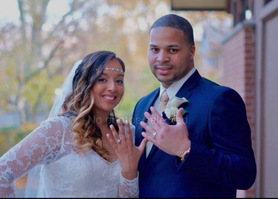 Eric Richardson with his wife on their wedding day