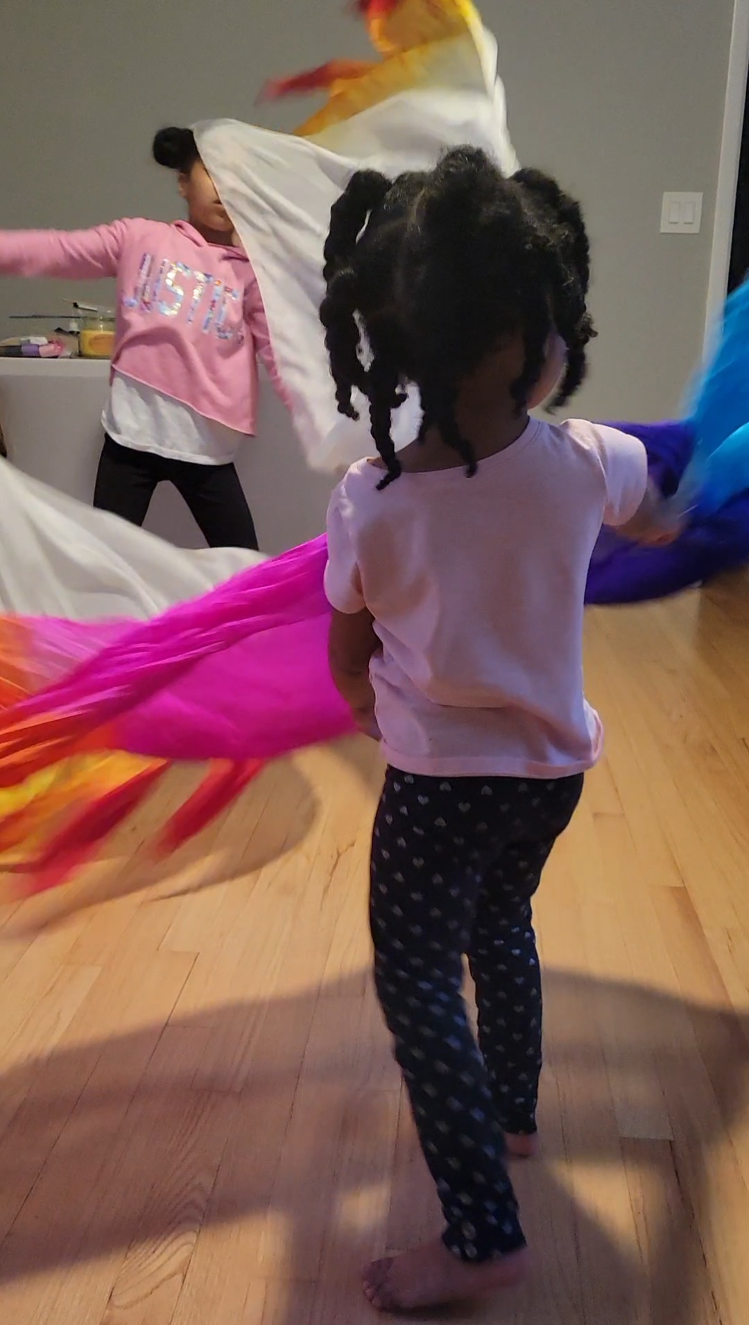 Little ones learning to worship with colorful silks together